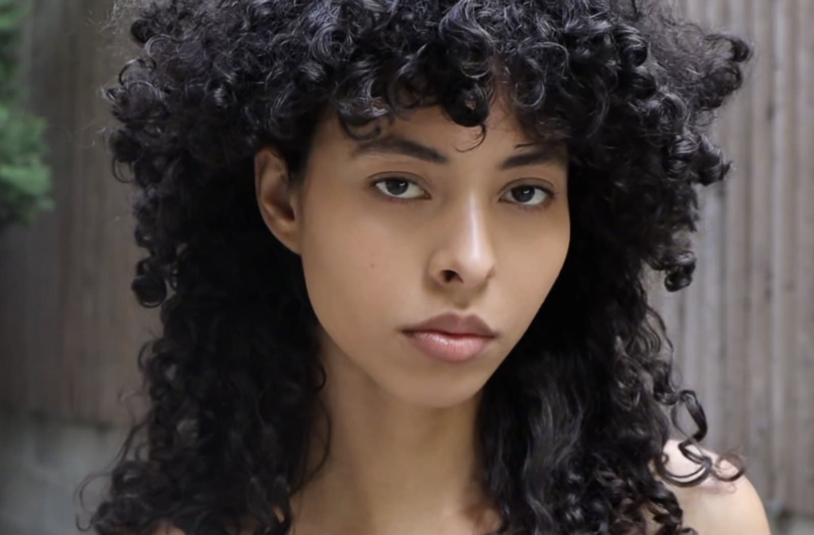 Digital, july 2026: head shot, natural curls, soft daylight